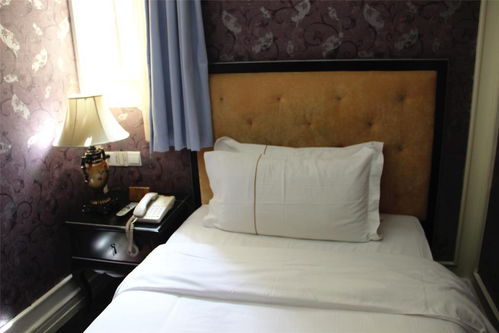 Manhattan Jinling Hotel Shanghái Habitación foto