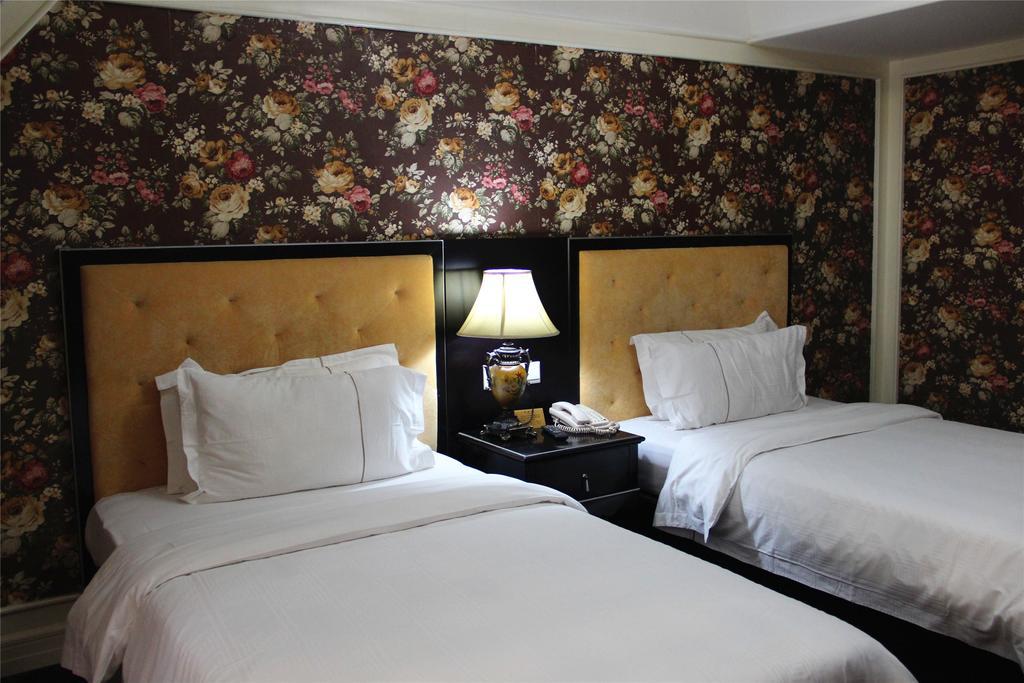 Manhattan Jinling Hotel Shanghái Habitación foto
