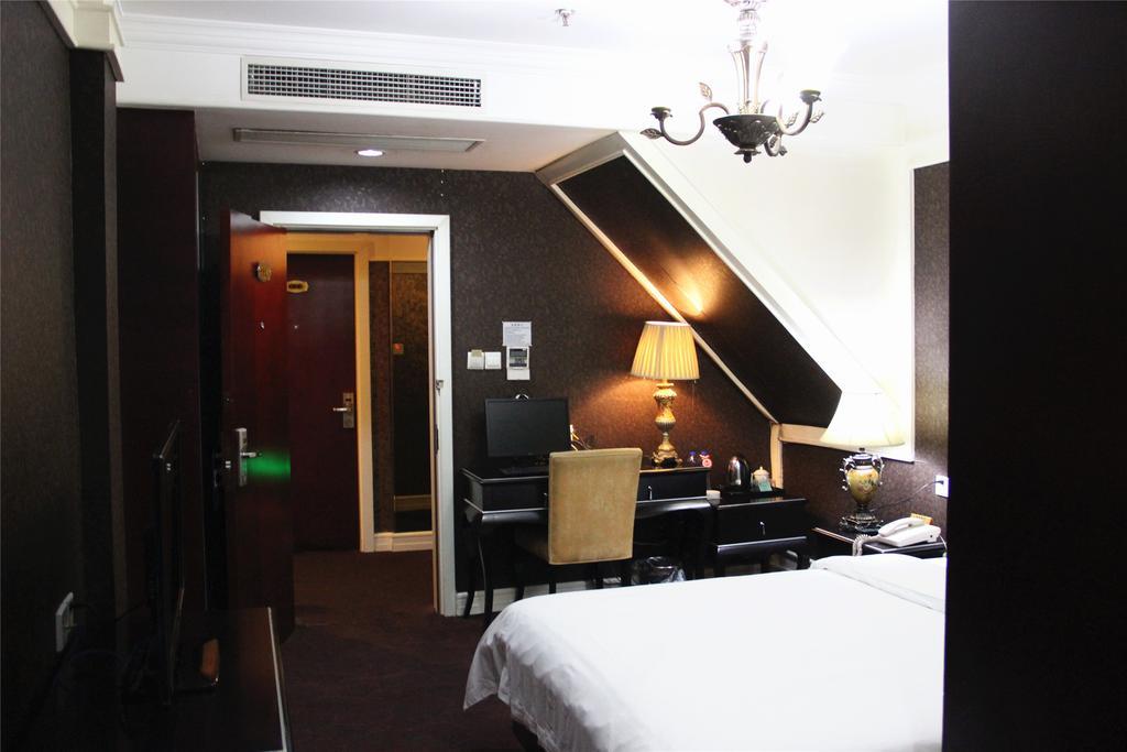 Manhattan Jinling Hotel Shanghái Habitación foto