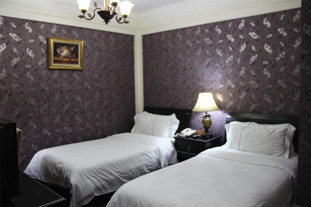 Manhattan Jinling Hotel Shanghái Habitación foto