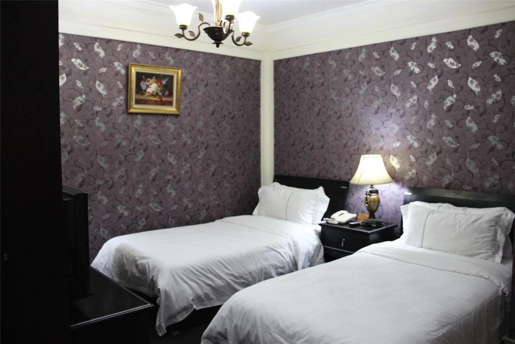 Manhattan Jinling Hotel Shanghái Habitación foto