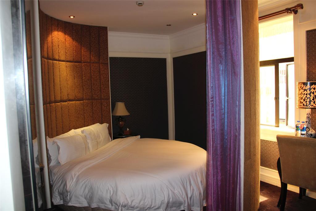 Manhattan Jinling Hotel Shanghái Habitación foto