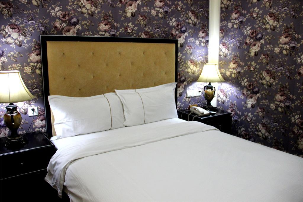 Manhattan Jinling Hotel Shanghái Habitación foto